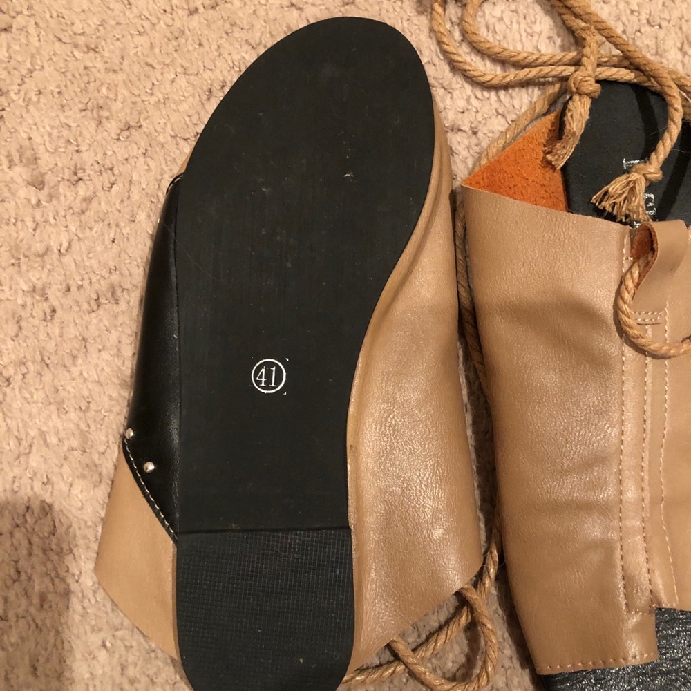 Size nine slip on flats with lace up ties